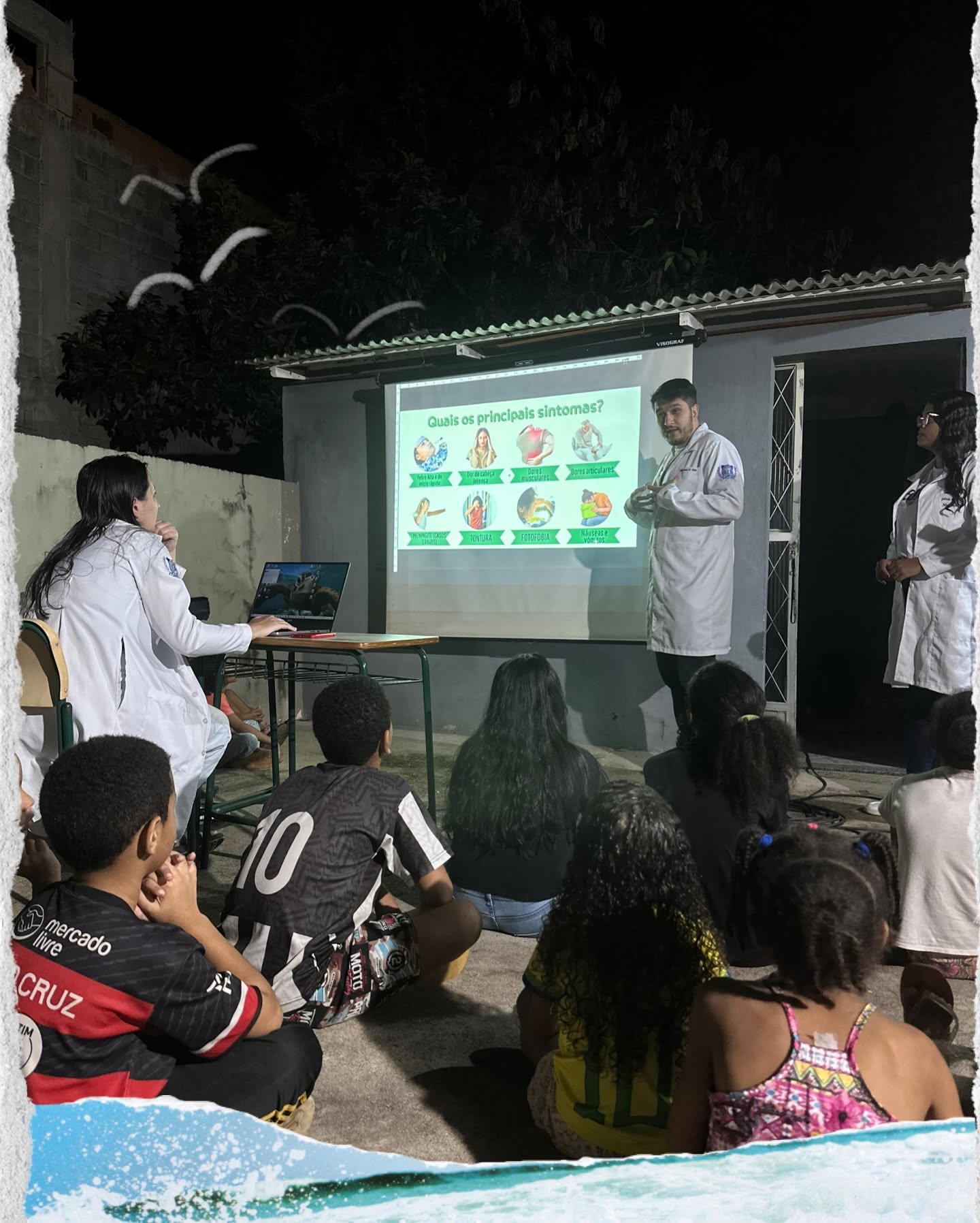 Crianças em roda de conversa com profissionais de saúde